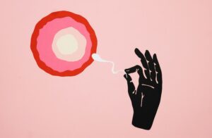 Illustration depicting fertilization with ovum and sperm on a pink background.